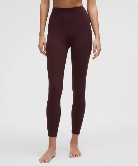 Dark maroon or plum-colored Lululemon Align high-rise leggings. 