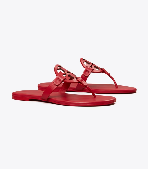 A pair of red Tory Burch Miller Soft Thong-Strap Sandals,